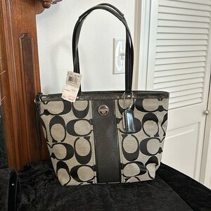 COACH NWT, black and white. 10”x14”.